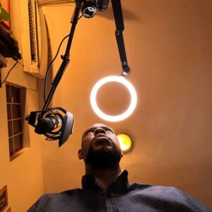 Ayinde Smith at recording a podcast.